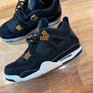 Jordan Black and Gold Sneakers